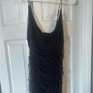 Size Large Urban Outfitters Black Mini Dress. Worn one time to a dinner.